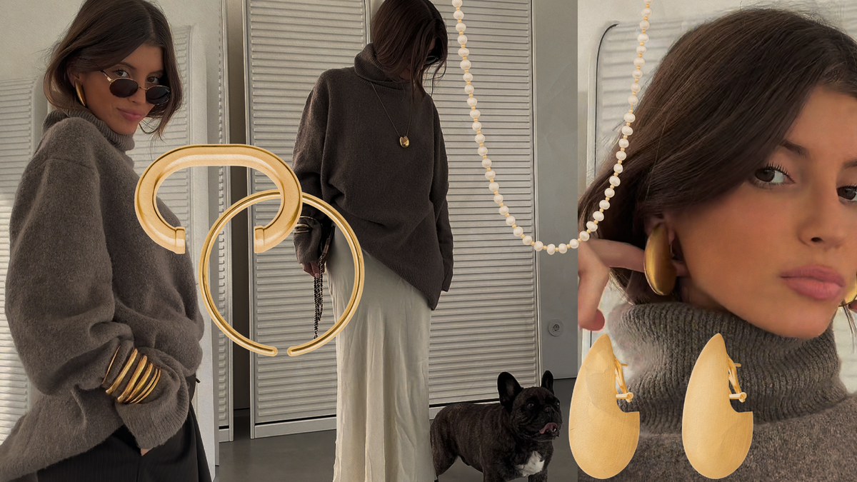 Jewelry styling trends for fashion creatives featuring bold earrings and layered necklaces with a chic outfit.