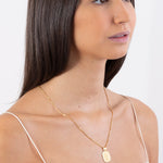 model wearing aimee necklace in gold