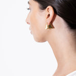 model wearing blake earrings in gold