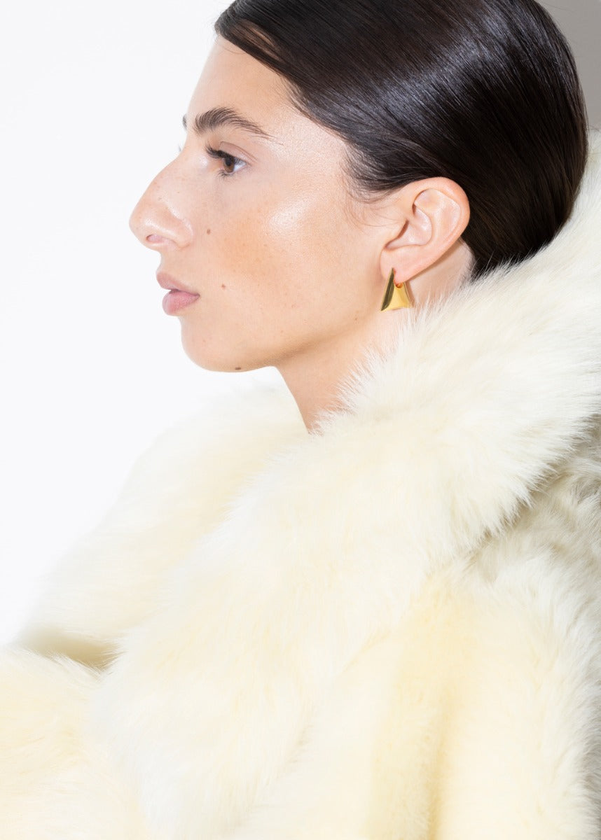 model wearing blake earrings in gold