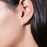 model wearing cate hoop 18k emerald