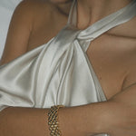 model wearing gala bracelet in gold