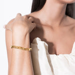 model wearing eden bracelet in gold