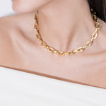 model wearing eden necklace in gold