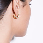 model wearing elise huggies in gold