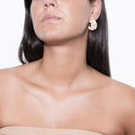 model wearing filomena earrings