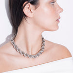 model wearing goliath bia necklace in silver