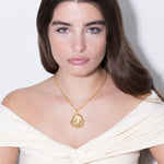 model wearing grace necklace in gold