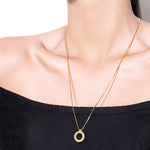 model wearing jodie necklace in gold