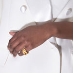 model wearing lang rings in gold