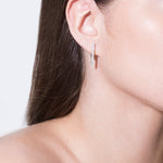 model wearing laura earrings in silver