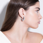 model wearing sarah earrings in silver