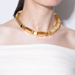 model wearing taylor necklace in gold