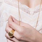 model wearing tilly ring in gold