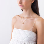 model wearing victoria necklace in gold